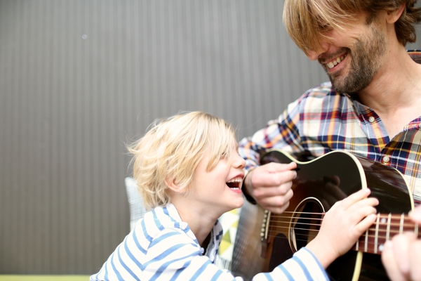 Singing Kids and parents.