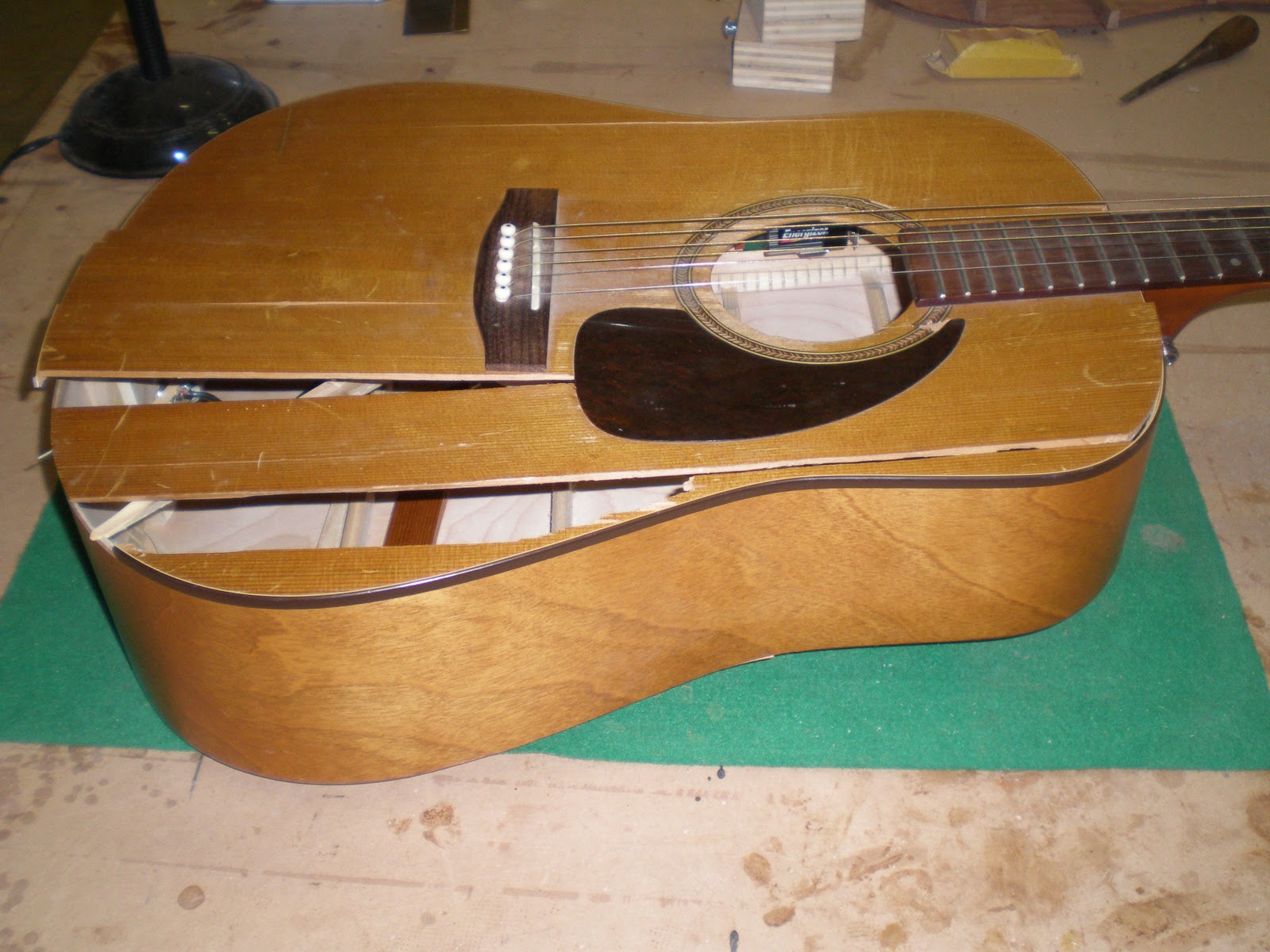 Broken Acoustic Guitar