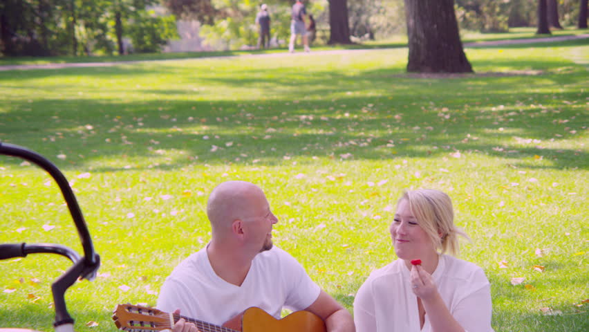 Man Playing Woman Song In Park